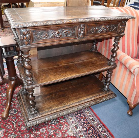 A late 19th century Flemish carved oak buffet W.100cm